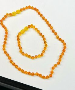 Bộ hổ phách amber lá bùa hộ mệnh quý giá cho trẻ em